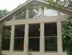 Porch-enclosure-with-double-hung-windows-in-Sandtone
